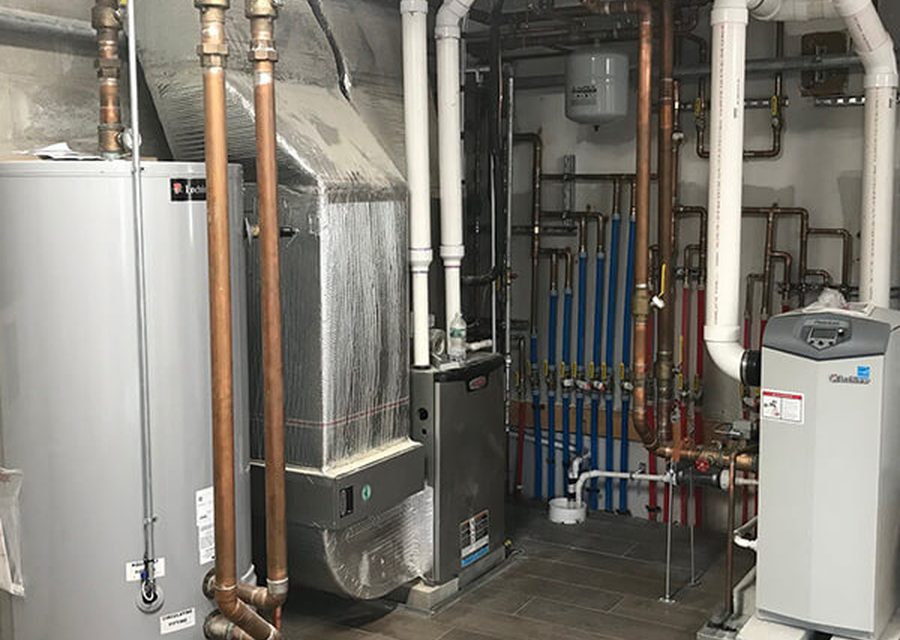 Mechanical room piping in a Denver basement
